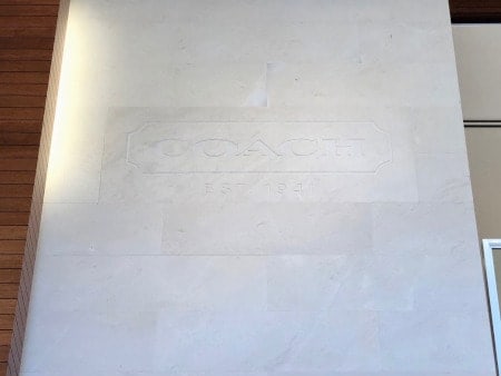 before removing etched stone signage